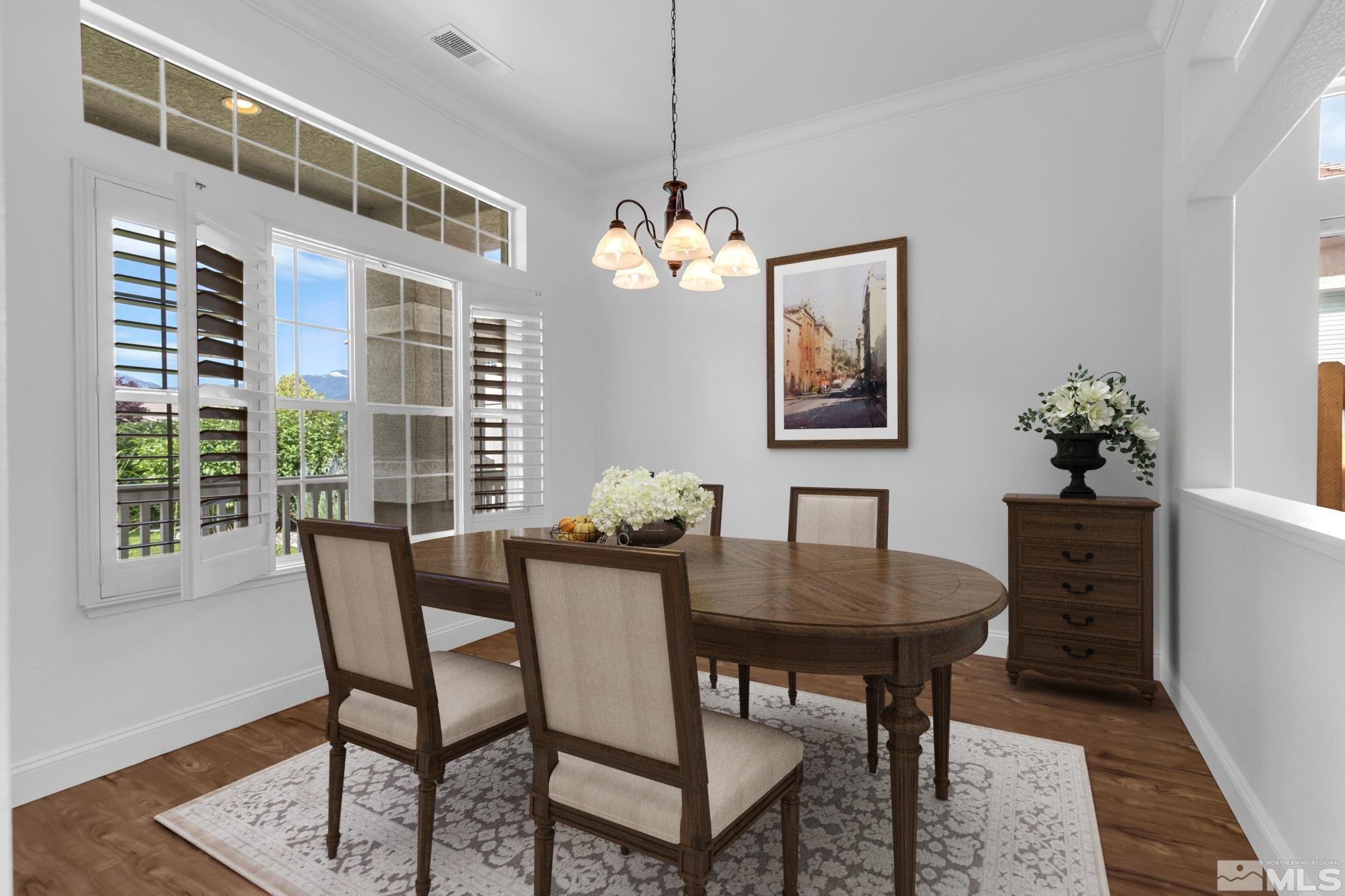 10445 Arbor Way Reno, NV 89521 - Photo 6 of 39 a view of a dining room with furniture window and wooden floor