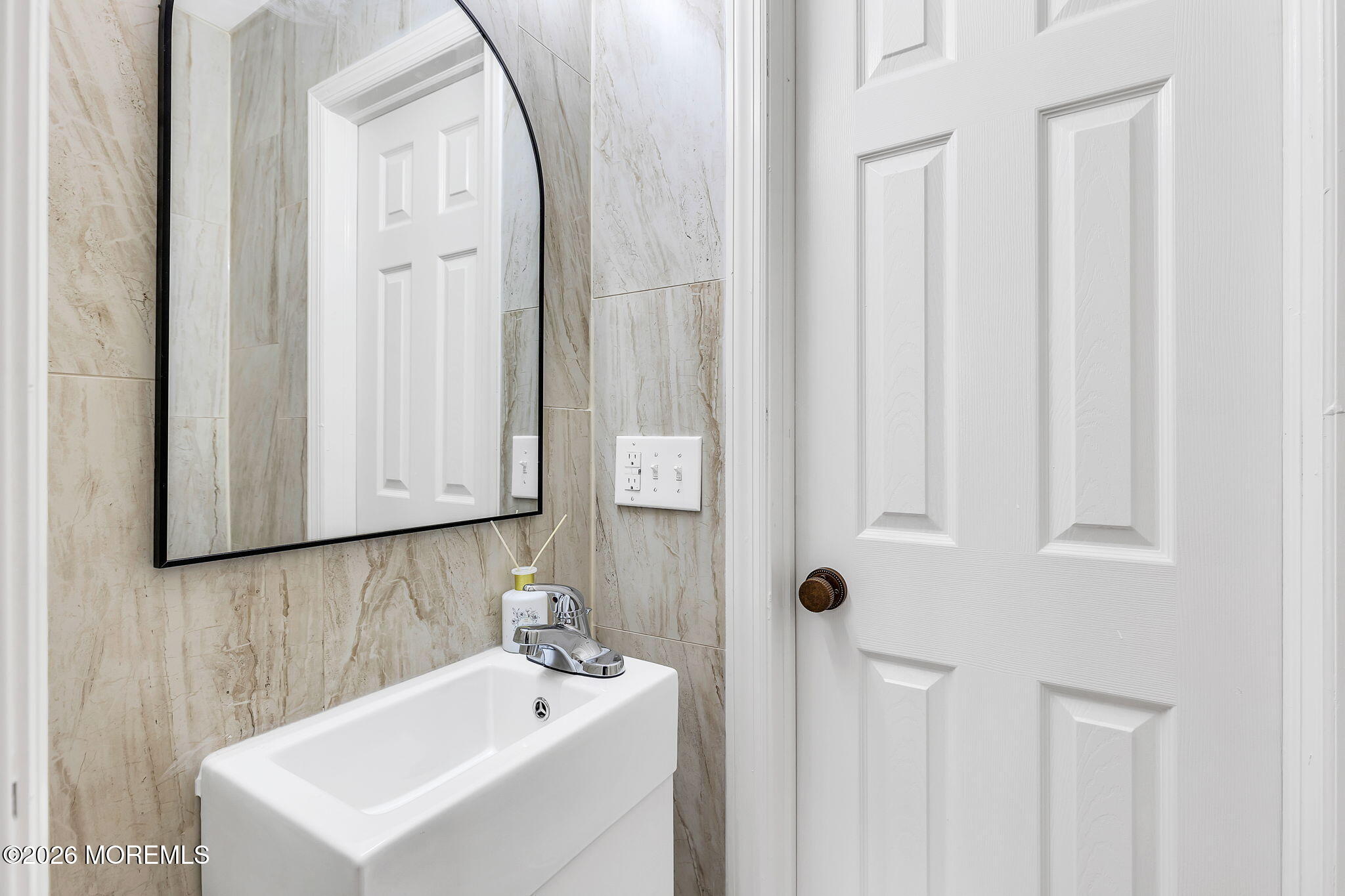 50 Westbrook Road Howell, NJ 07731 - Photo 34 of 73 a bathroom with a sink and a mirror