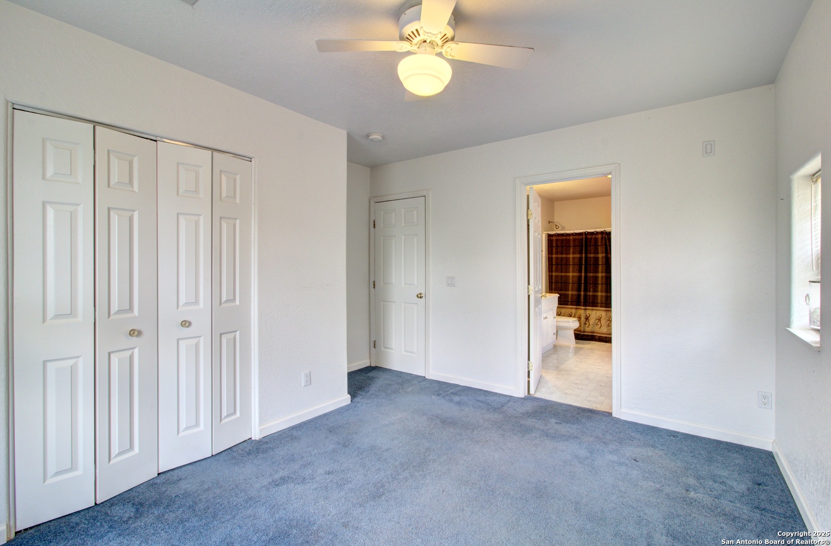 6248 Yorkshire Drive Spring Branch, TX 78070 - Photo 23 of 28 an empty room with windows and closet