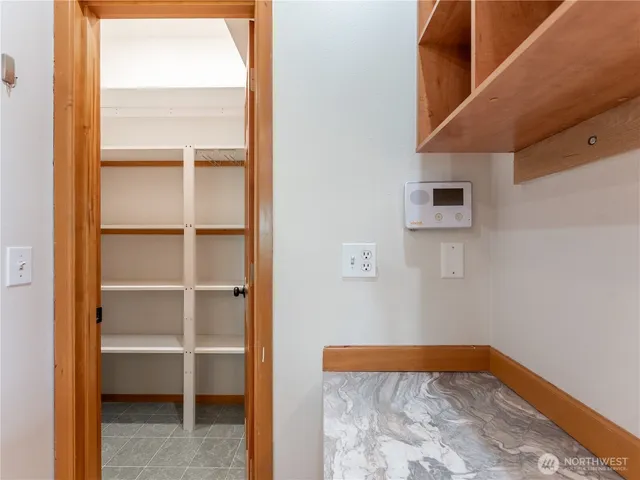 a view of a kitchen with a sink and an cabinet