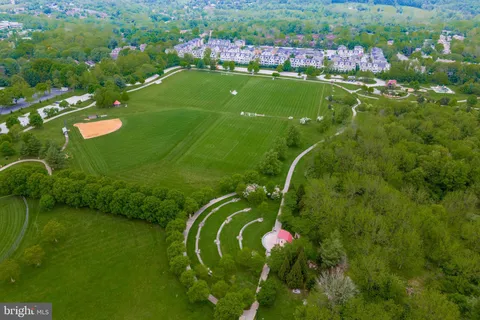 a view of a golf course with a lake
