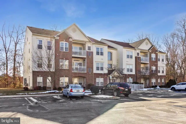 a front view of a building with street view