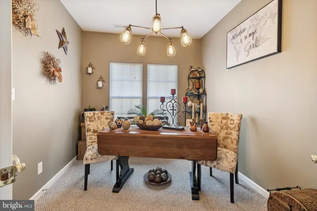 a view of a workspace with furniture