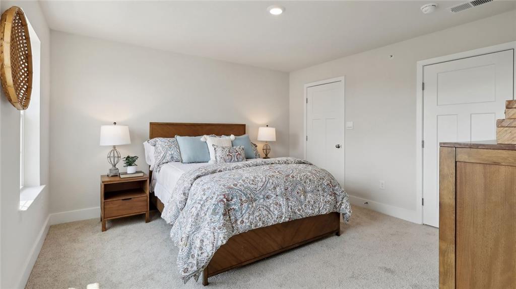 540 Cooper Street Wexford, PA 15090 - Photo 12 of 19 a bedroom with a bed and a mirror