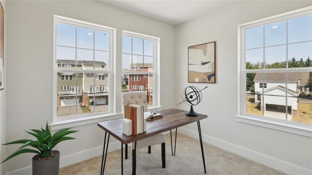 540 Cooper Street Wexford, PA 15090 - Photo 17 of 19 a view of a workspace with furniture and a potted plant