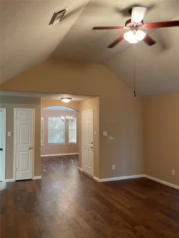 a kitchen with cabinets a sink and appliances