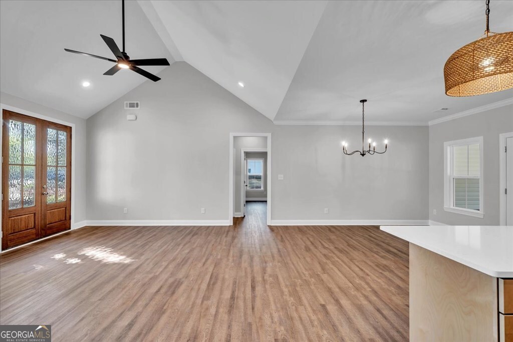 2767 Claxton Dairy Road Dublin, GA 31021 - Photo 11 of 51 a view of an empty room with wooden floor and a window