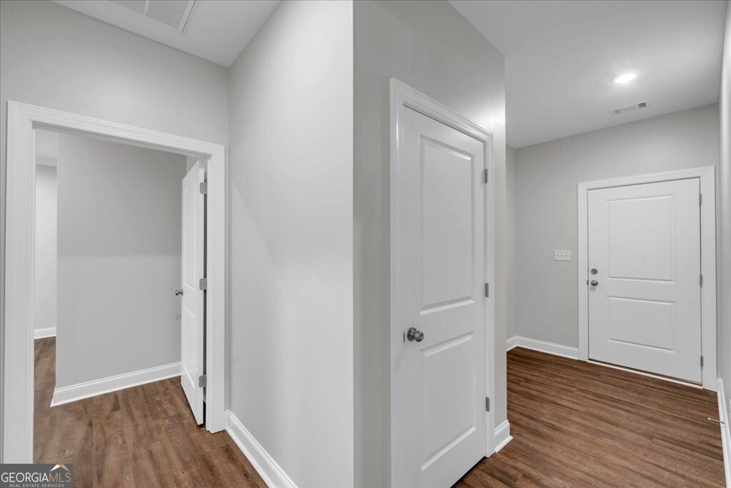 2767 Claxton Dairy Road Dublin, GA 31021 - Photo 17 of 51 a view of a hallway with wooden floor