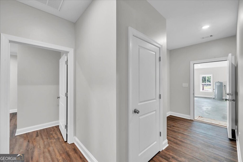2767 Claxton Dairy Road Dublin, GA 31021 - Photo 18 of 51 a view of hallway with wooden floor