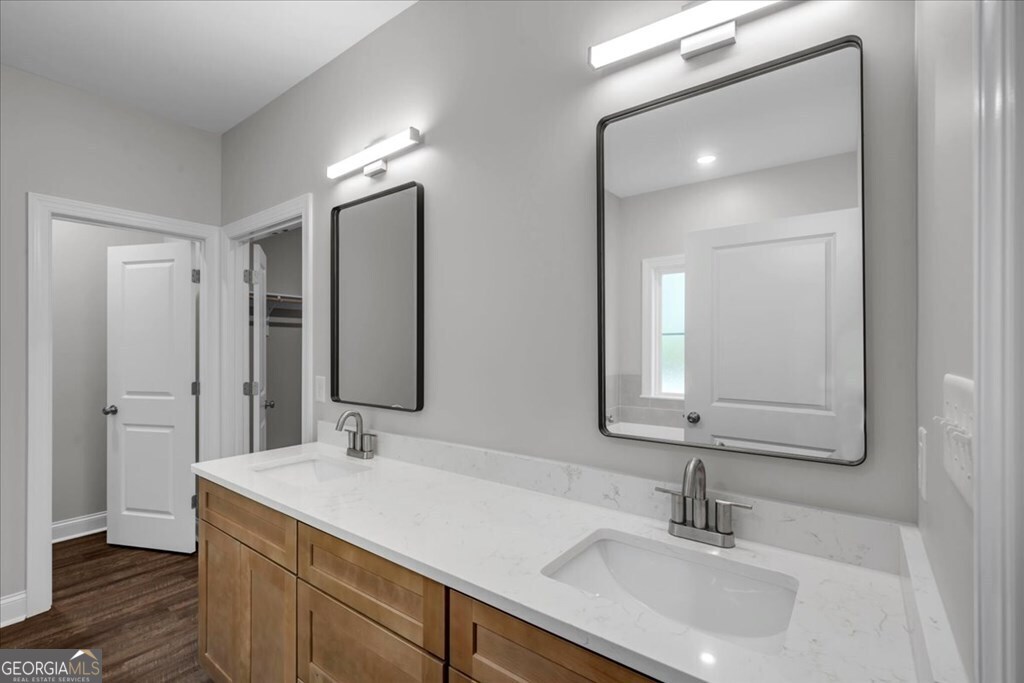 2767 Claxton Dairy Road Dublin, GA 31021 - Photo 24 of 51 a bathroom with a sink and a mirror