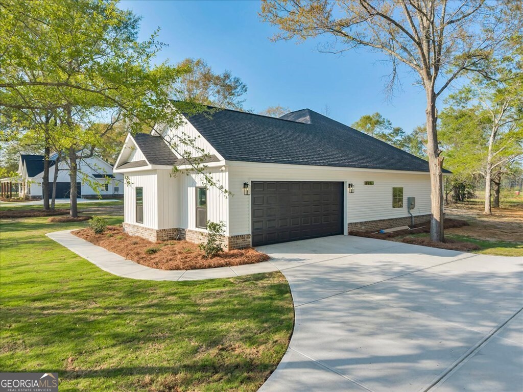 2767 Claxton Dairy Road Dublin, GA 31021 - Photo 45 of 51 a front view of a house with entertaining space