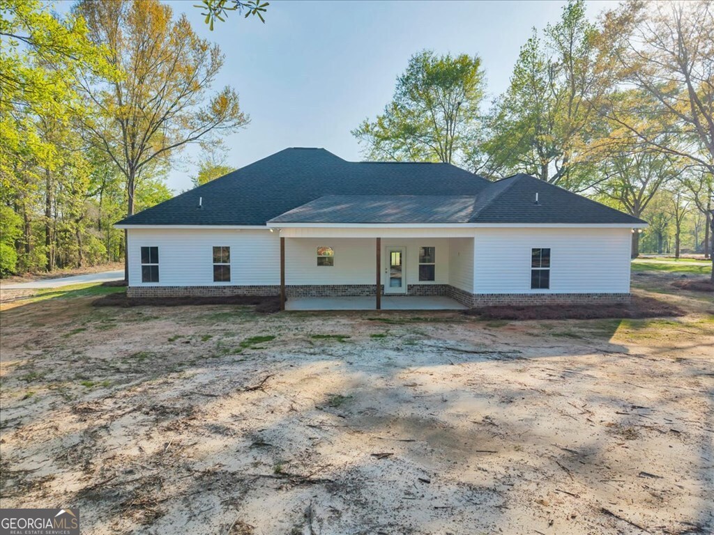 2767 Claxton Dairy Road Dublin, GA 31021 - Photo 46 of 51 a view of a house with a yard