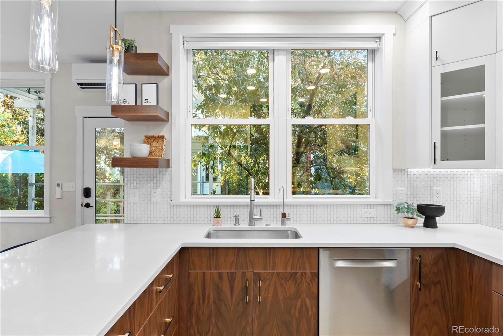 4742 16th Street Boulder, CO 80304 - Photo 11 of 48 a kitchen with a sink and a window