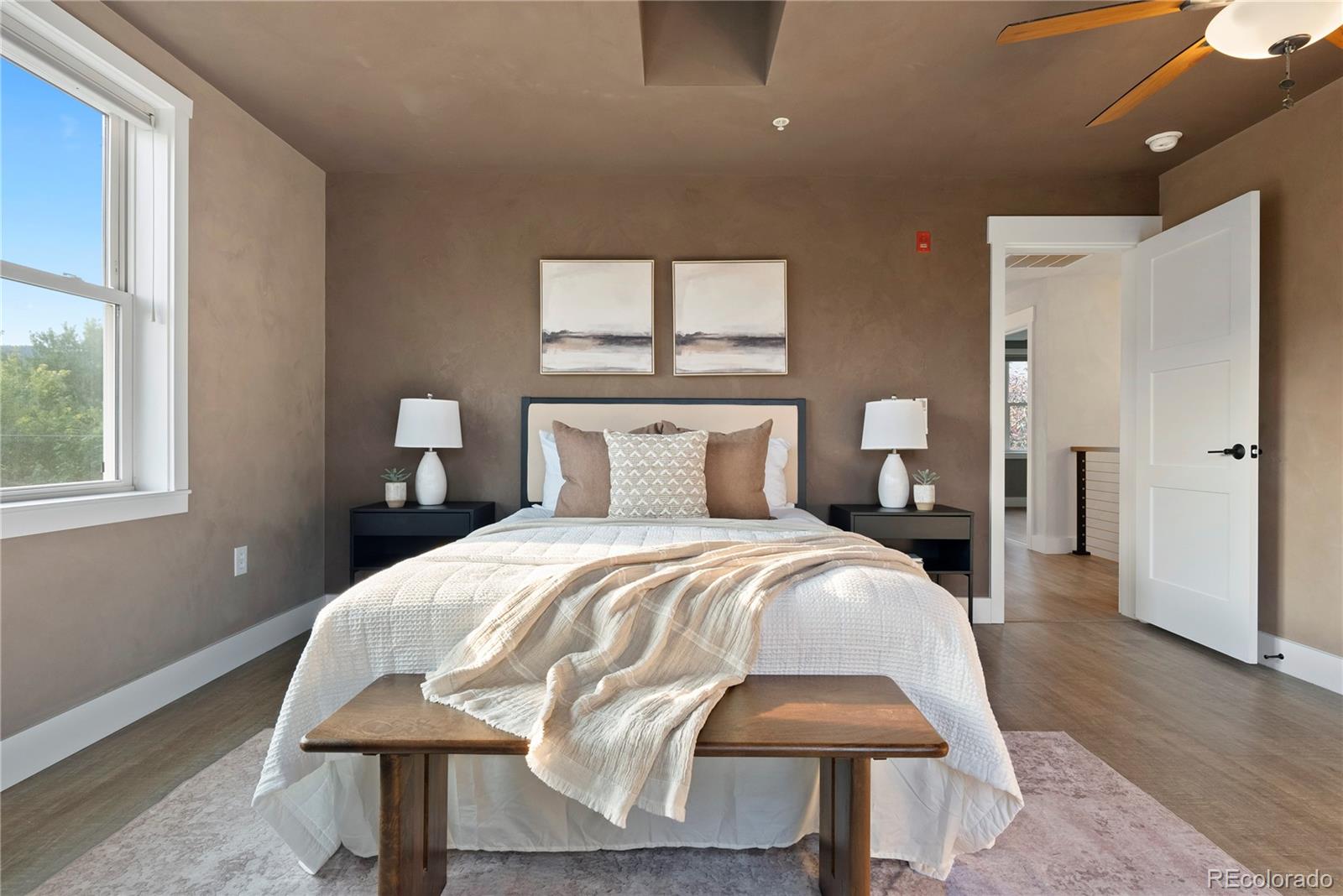 4742 16th Street Boulder, CO 80304 - Photo 19 of 48 a bedroom with a bed and a table