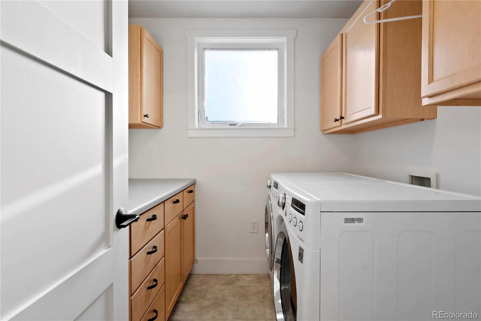 4742 16th Street Boulder, CO 80304 - Photo 26 of 48 a utility room with dryer and washer