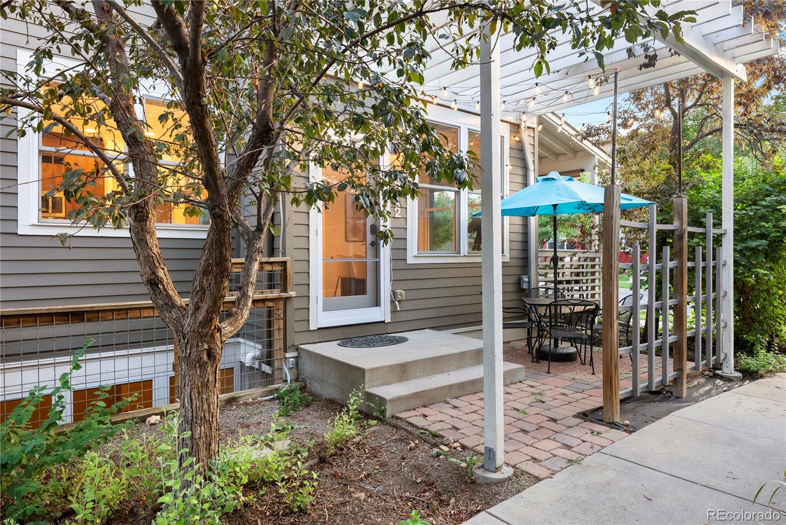 4742 16th Street Boulder, CO 80304 - Photo 32 of 48 a view of a house with a yard and large tree