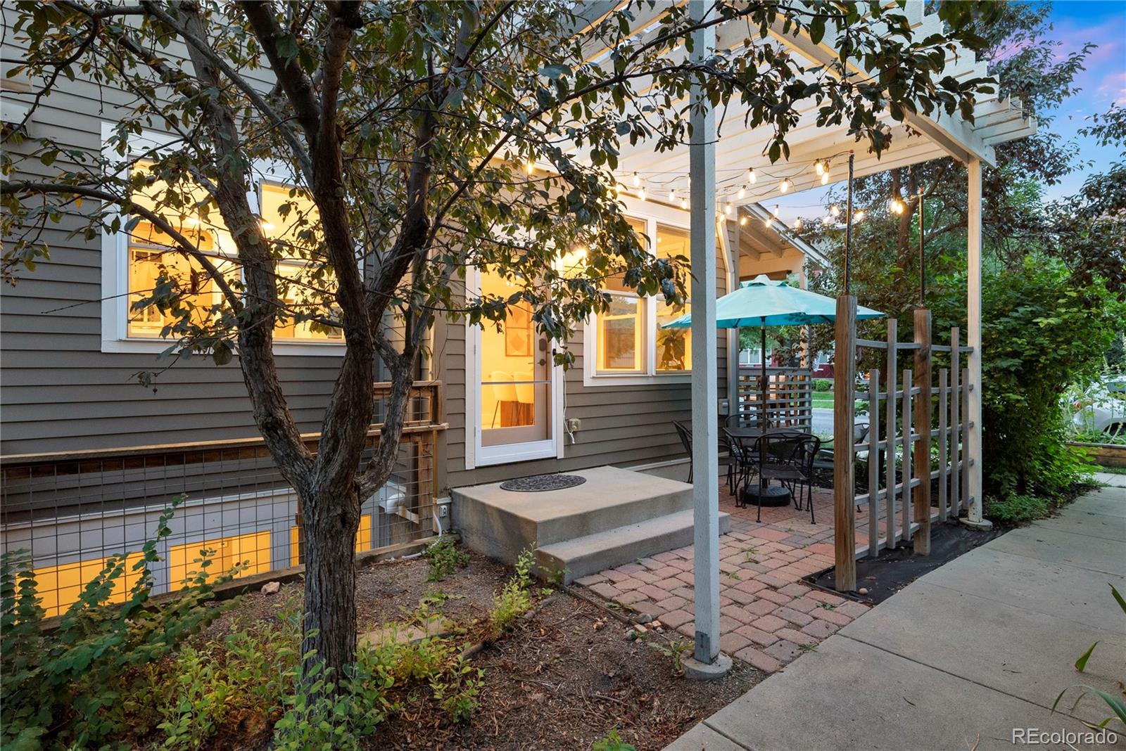 4742 16th Street Boulder, CO 80304 - Photo 33 of 48 a front view of a house with a tree