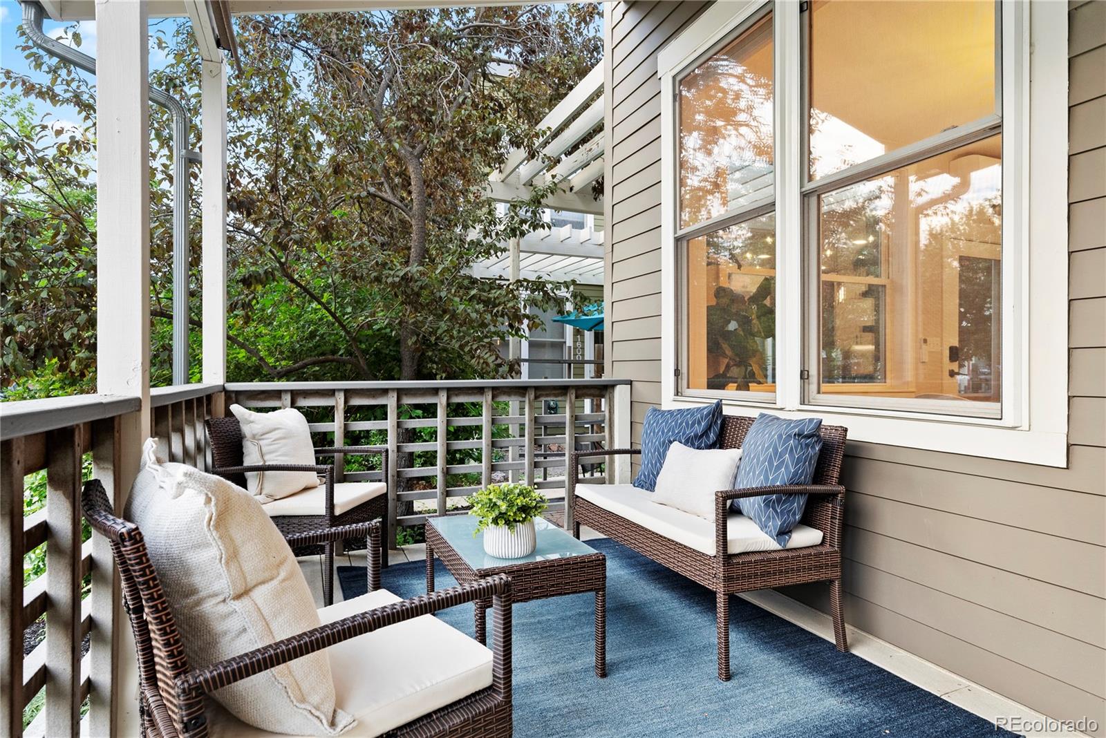 4742 16th Street Boulder, CO 80304 - Photo 35 of 48 a balcony with furniture and wooden floor
