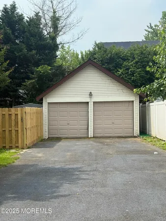a view of a house with a garage
