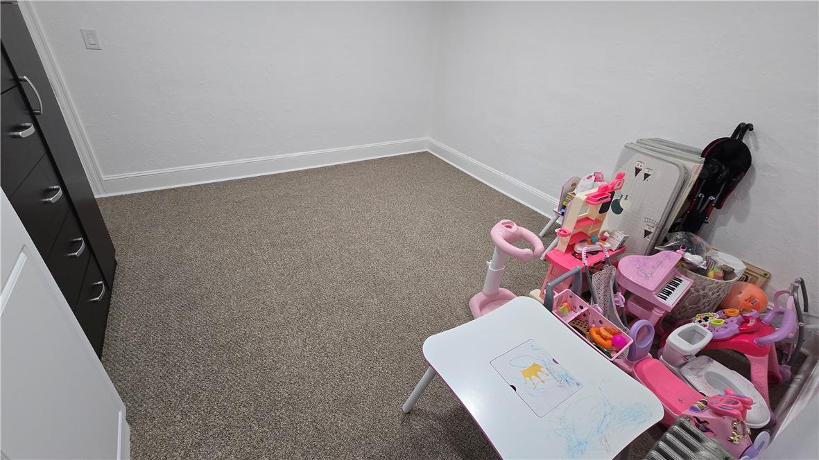 883 North Locust Street Hazleton, PA 18201 - Photo 49 of 83 A well-maintained floor provides a versatile space perfect for a home office or creative pursuits.