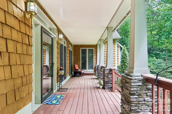 a view of balcony with chairs