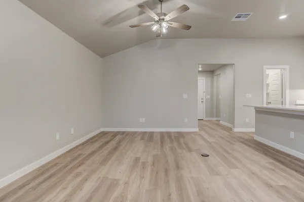 an empty room with windows