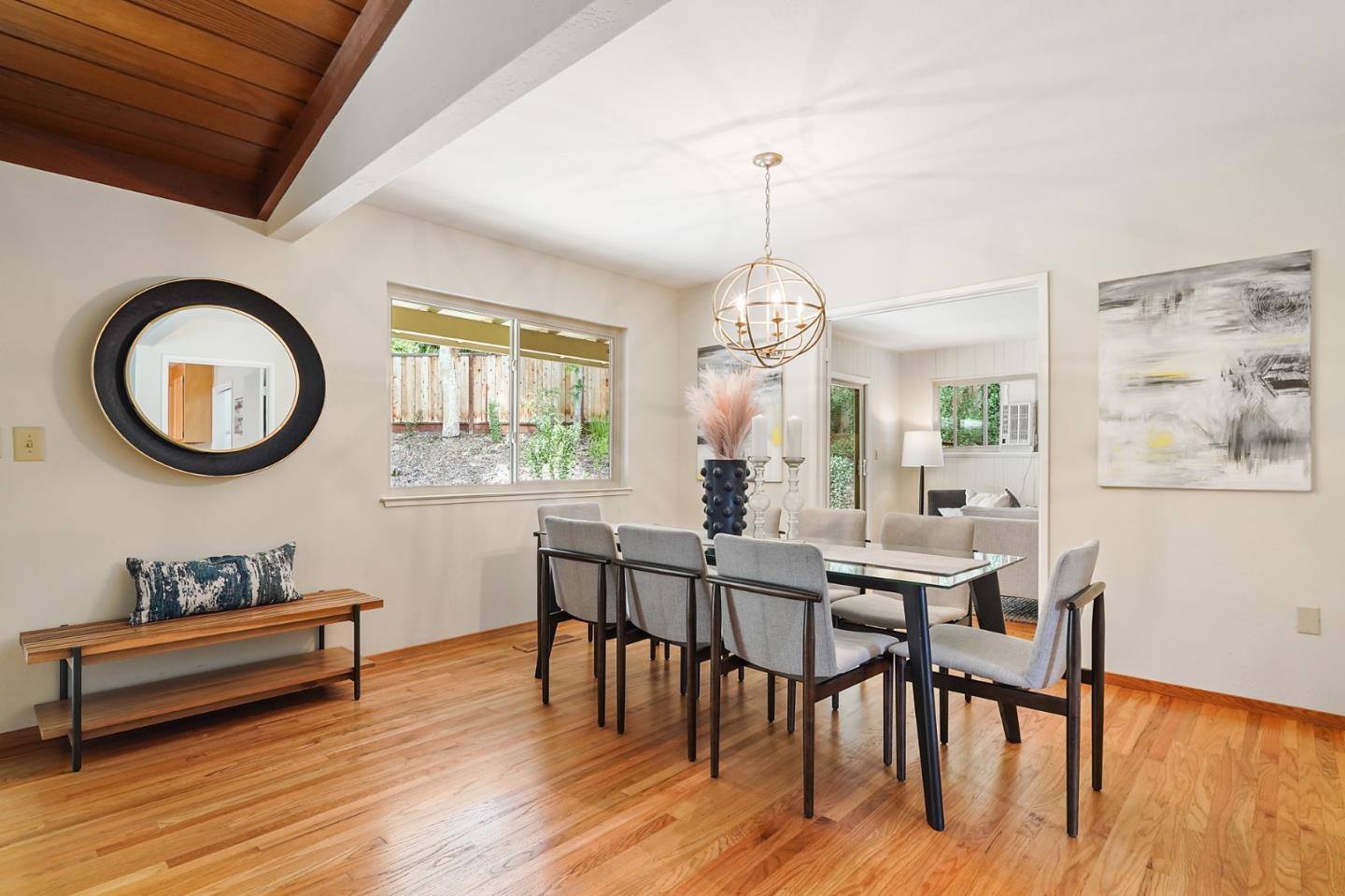 810 Cedro Way Stanford, CA 94305 - Photo 11 of 36 a view of a dining room with furniture a chandelier and wooden floor