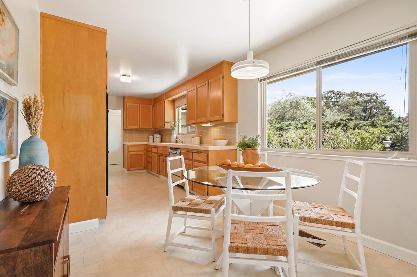 810 Cedro Way Stanford, CA 94305 - Photo 13 of 36 a dining room with furniture and a chandelier