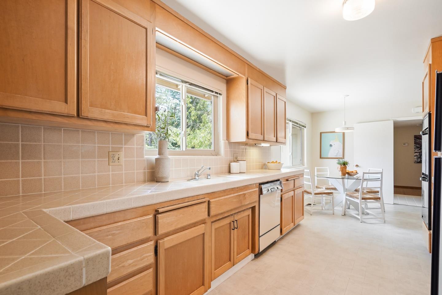 810 Cedro Way Stanford, CA 94305 - Photo 16 of 36 a kitchen with a sink and cabinets