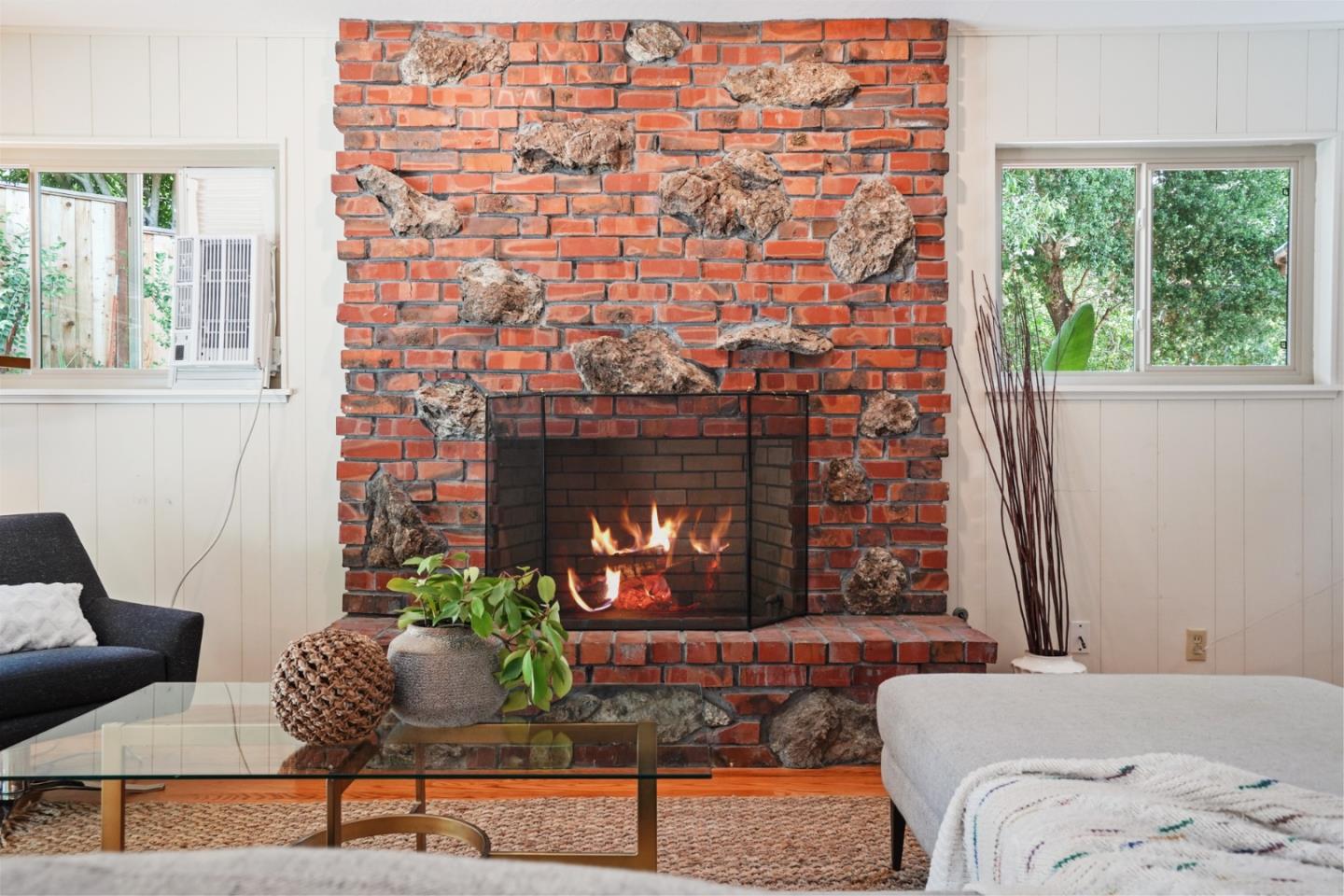 810 Cedro Way Stanford, CA 94305 - Photo 18 of 36 a living room with furniture and a fireplace