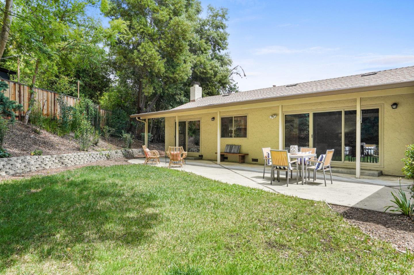 810 Cedro Way Stanford, CA 94305 - Photo 32 of 36 a view of backyard of house with outdoor seating and green space