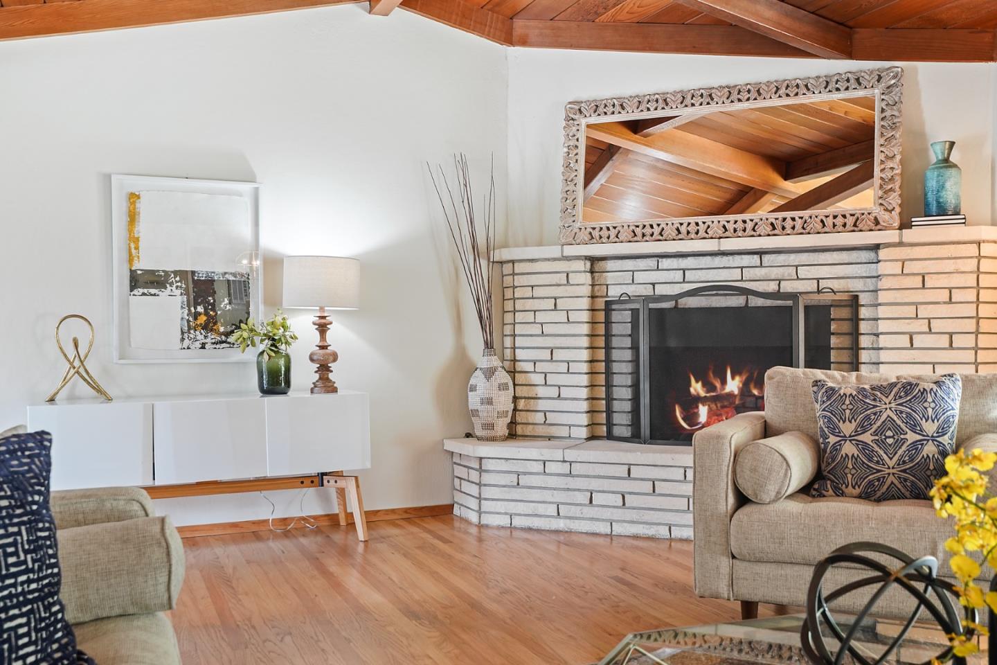 810 Cedro Way Stanford, CA 94305 - Photo 8 of 36 a living room with furniture and a fireplace