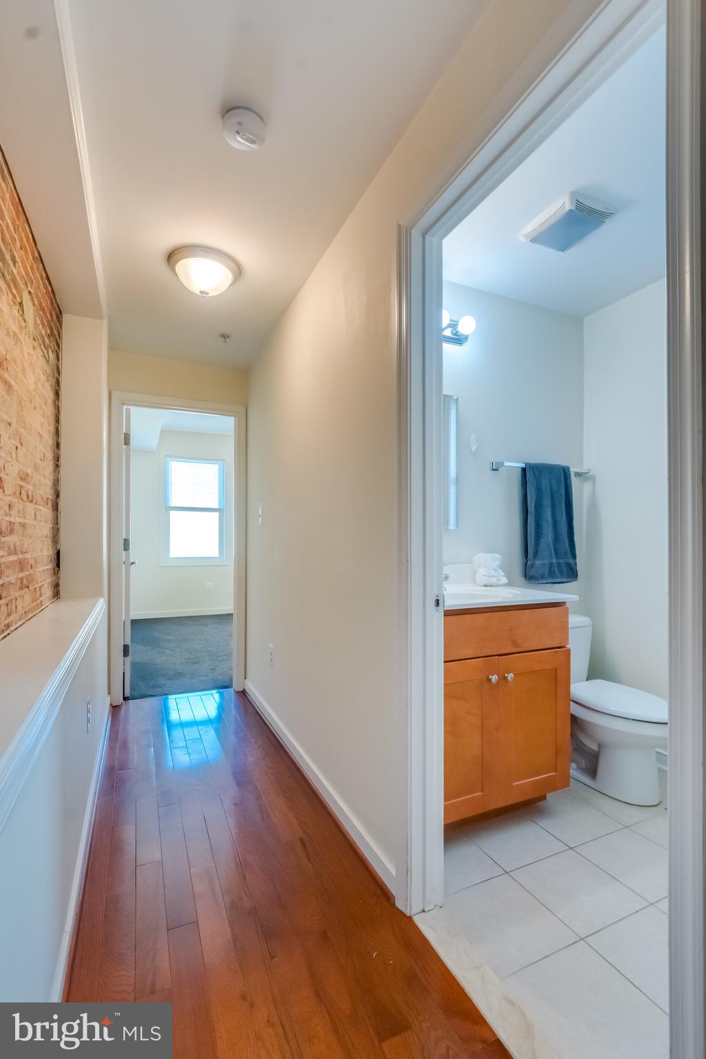 910 South Charles Street, Unit A Baltimore, MD 21230 - Photo 18 of 43 Hallway To Bedroom & Bathrooms