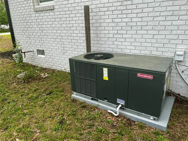 a house with trees in the background