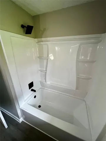 a bathroom with a bathtub