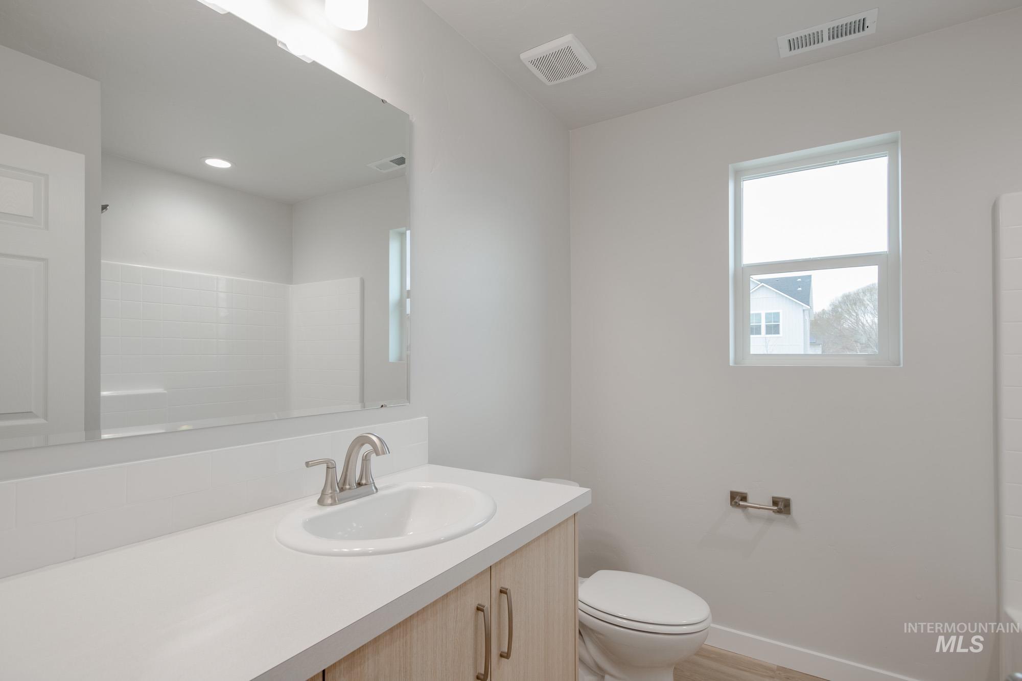 3090 South Maple Rnch Way Nampa, ID 83686 - Photo 16 of 22 Full bath featuring vanity and toilet
