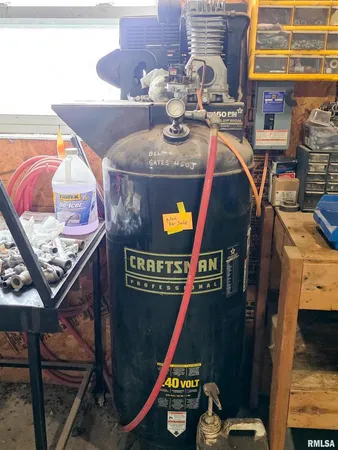 a kitchen with wooden cabinets and a stove top oven