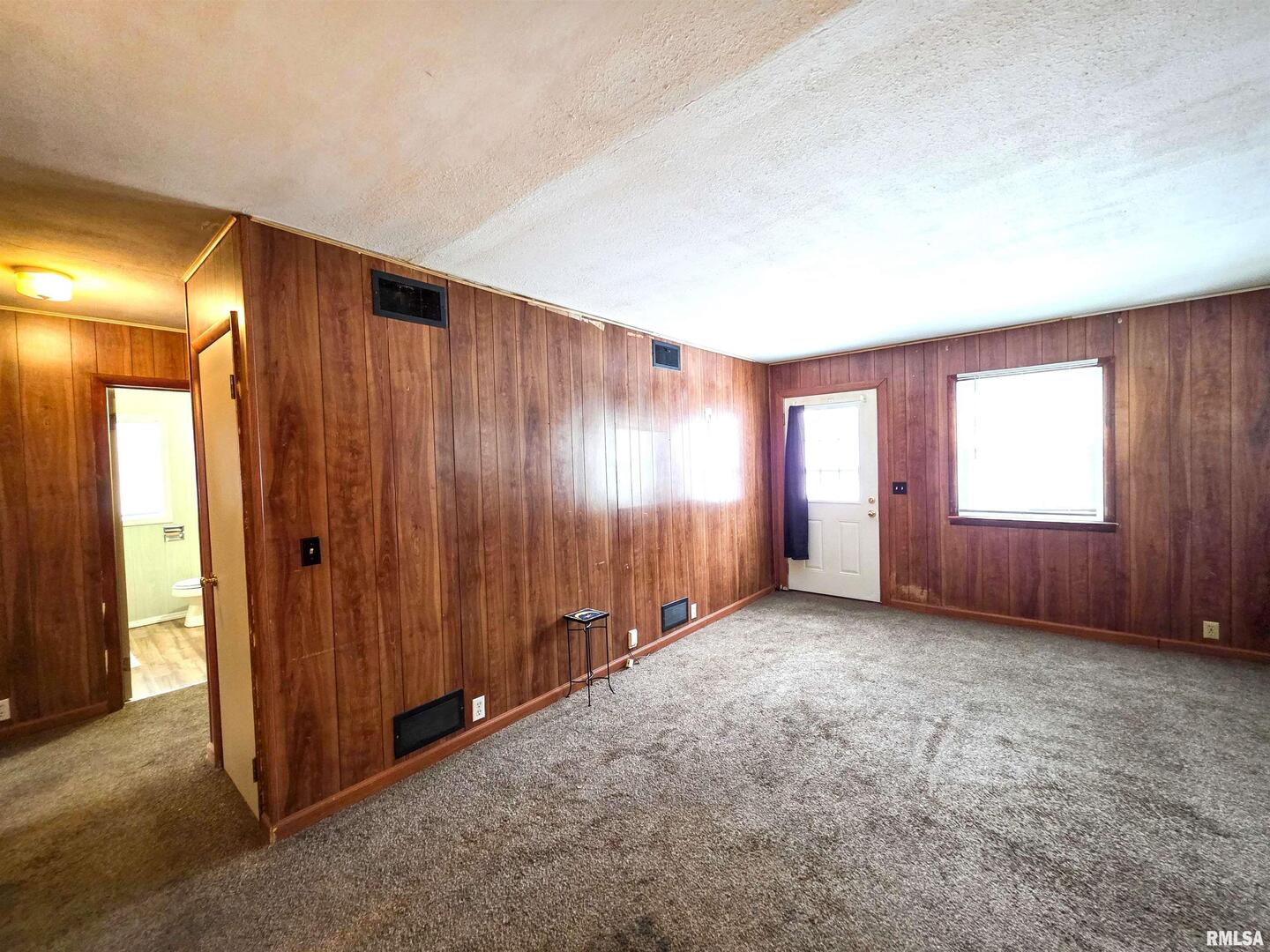 103 Watkins Street Cisne, IL 62823 - Photo 37 of 85 an empty room with windows and closet area