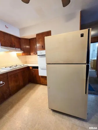 a view of a swimming pool with a yard