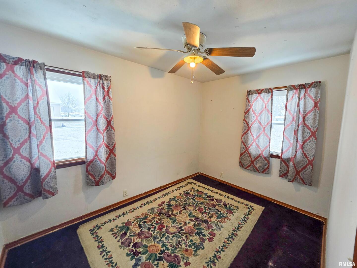 103 Watkins Street Cisne, IL 62823 - Photo 59 of 85 a view of an empty room with window and wooden floor
