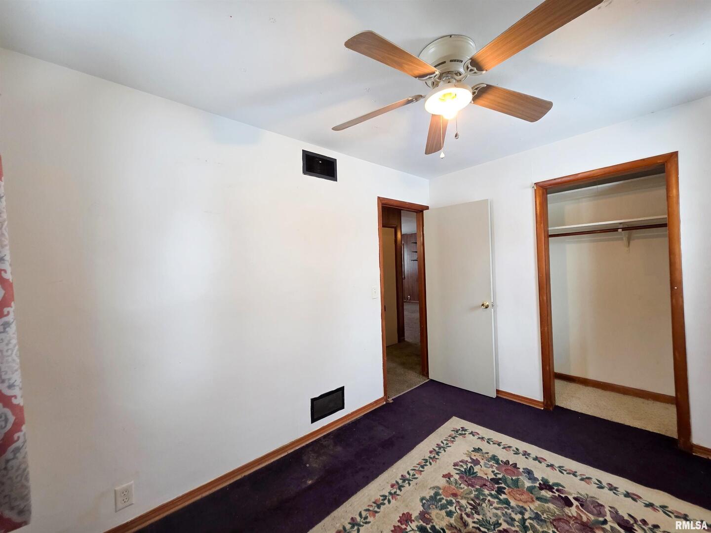 103 Watkins Street Cisne, IL 62823 - Photo 60 of 85 a view of an empty room with window and wooden floor