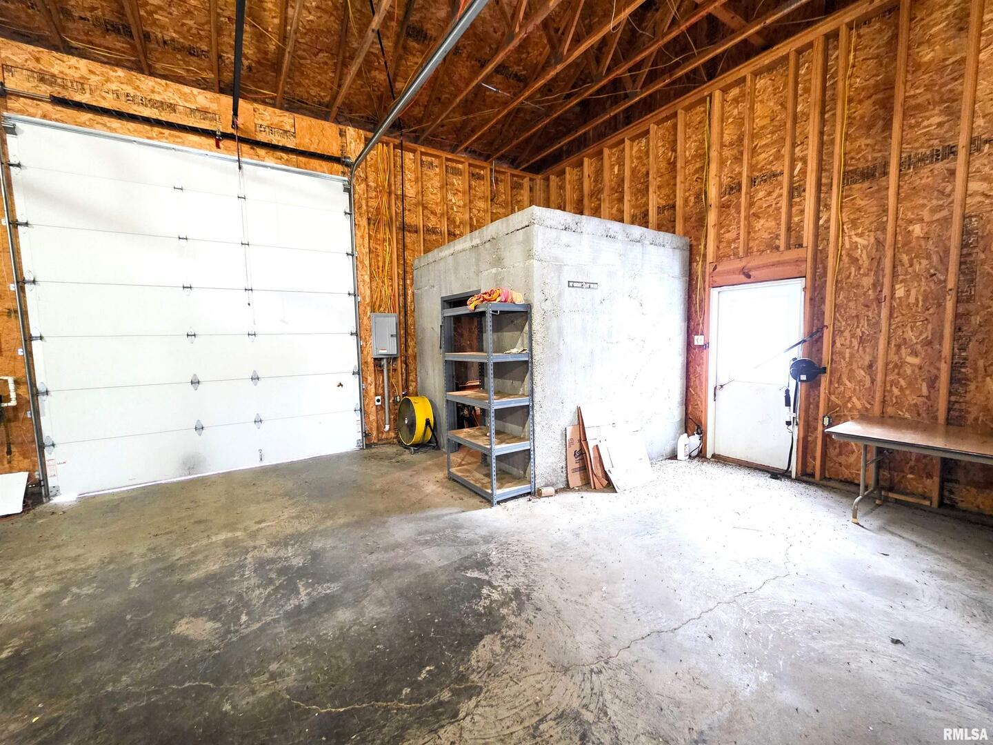 103 Watkins Street Cisne, IL 62823 - Photo 10 of 85 a view of a big room with furniture and a large window
