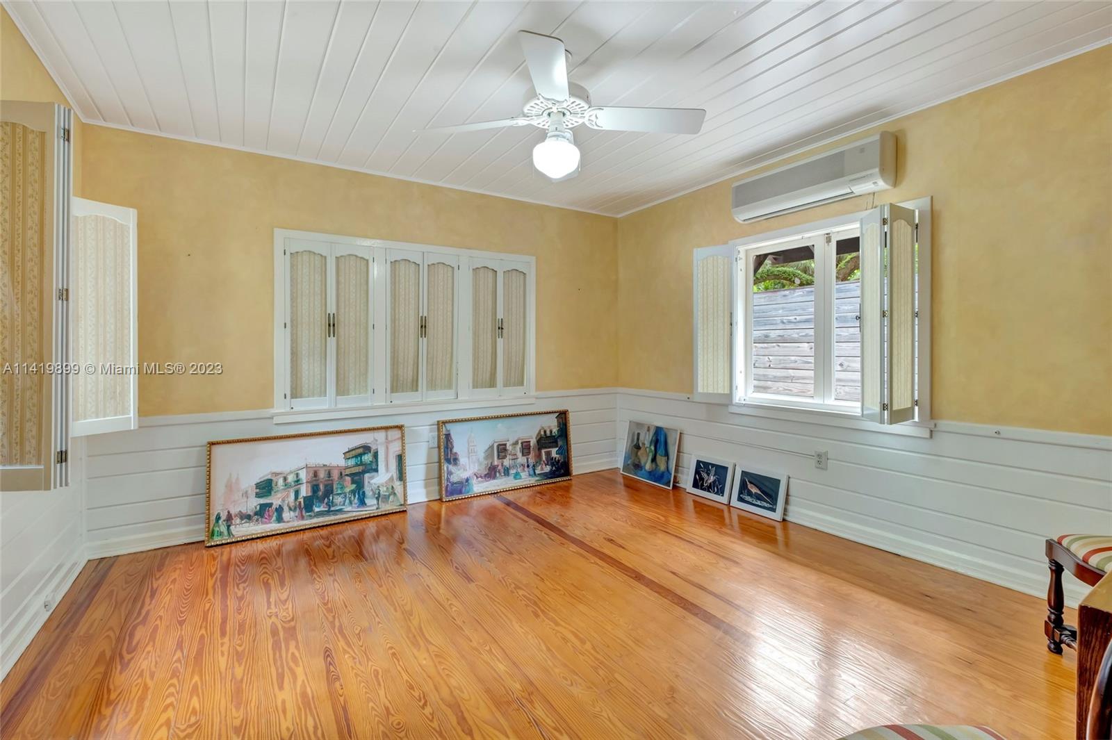 2801 Emathla Street Miami, FL 33133 - Photo 4 of 16 a spacious bathroom with a large tub