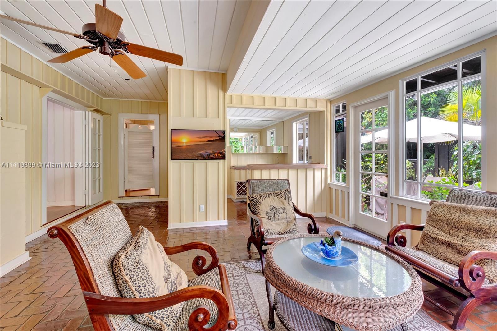 2801 Emathla Street Miami, FL 33133 - Photo 7 of 16 a living room with furniture and a large window