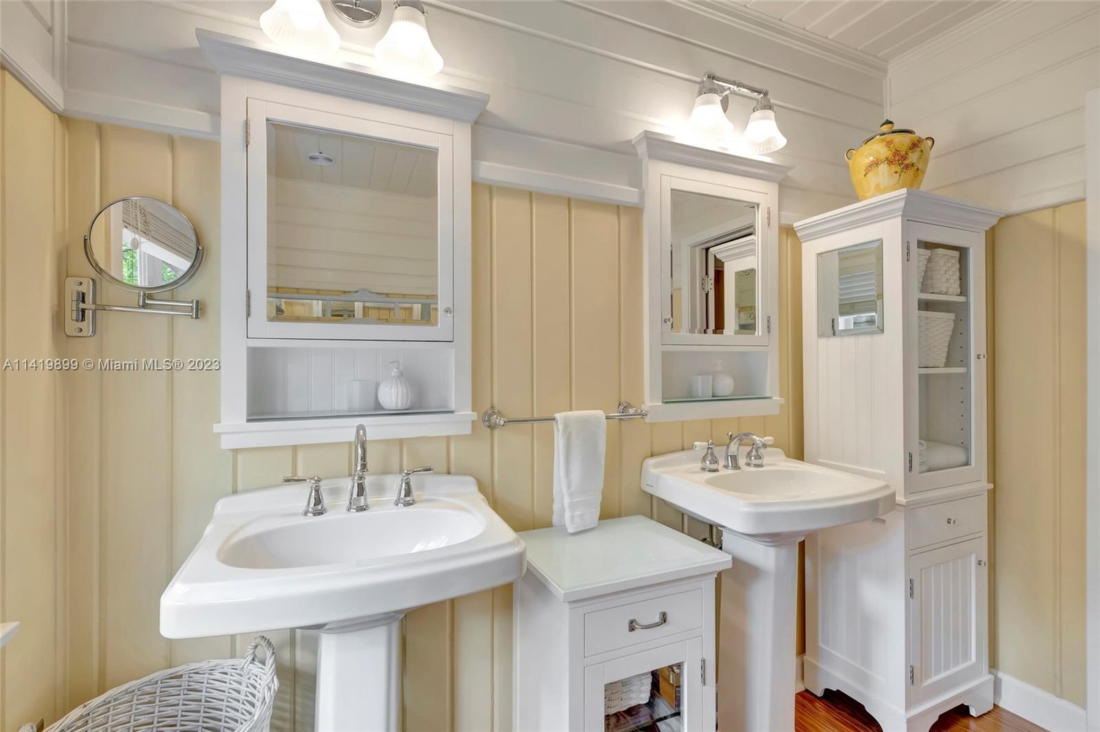 2801 Emathla Street Miami, FL 33133 - Photo 8 of 16 a bathroom with a sink and a mirror