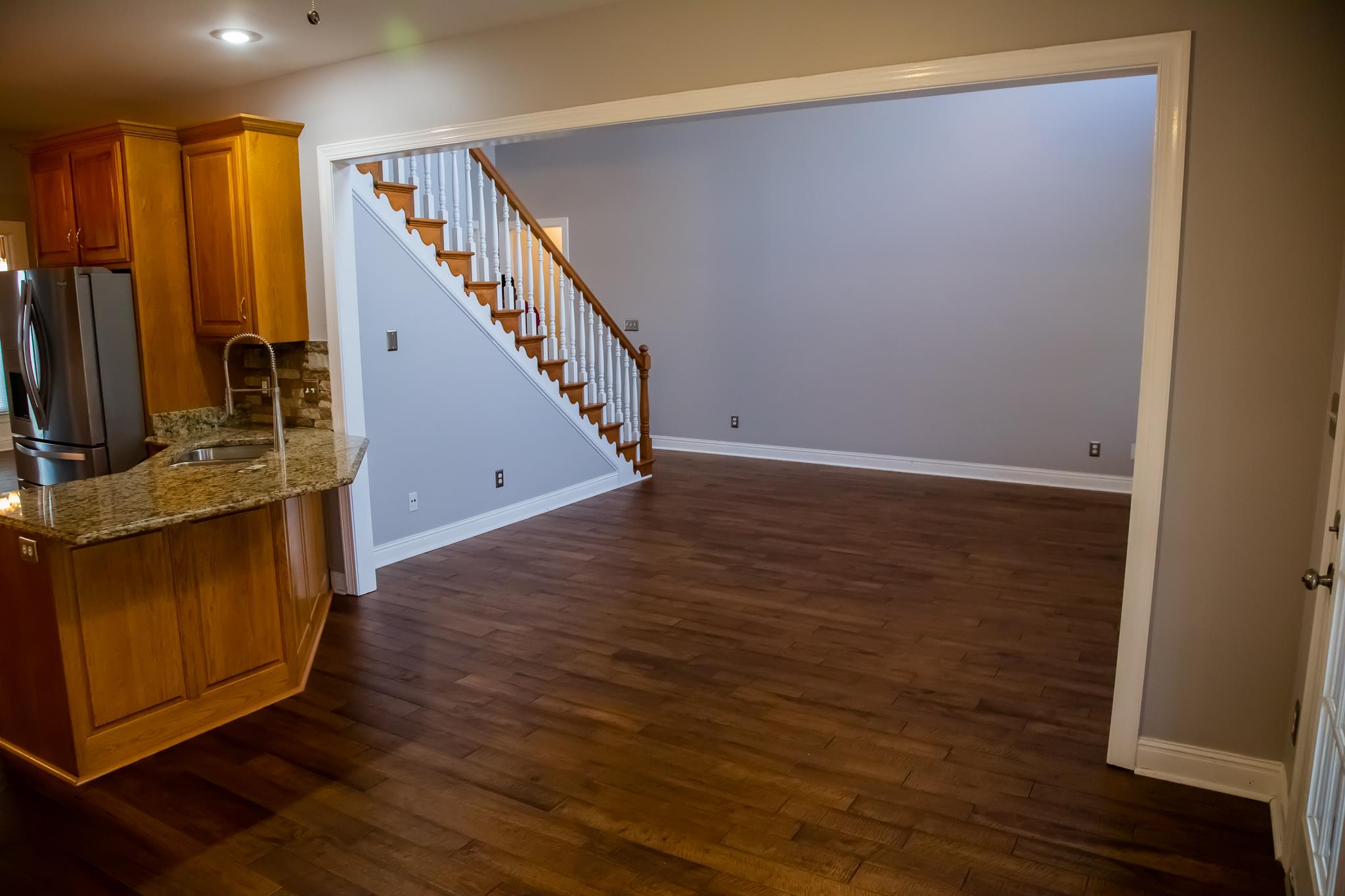 4871 Sango Road Clarksville, TN 37043 - Photo 18 of 30 wooden floor in an empty room with a window
