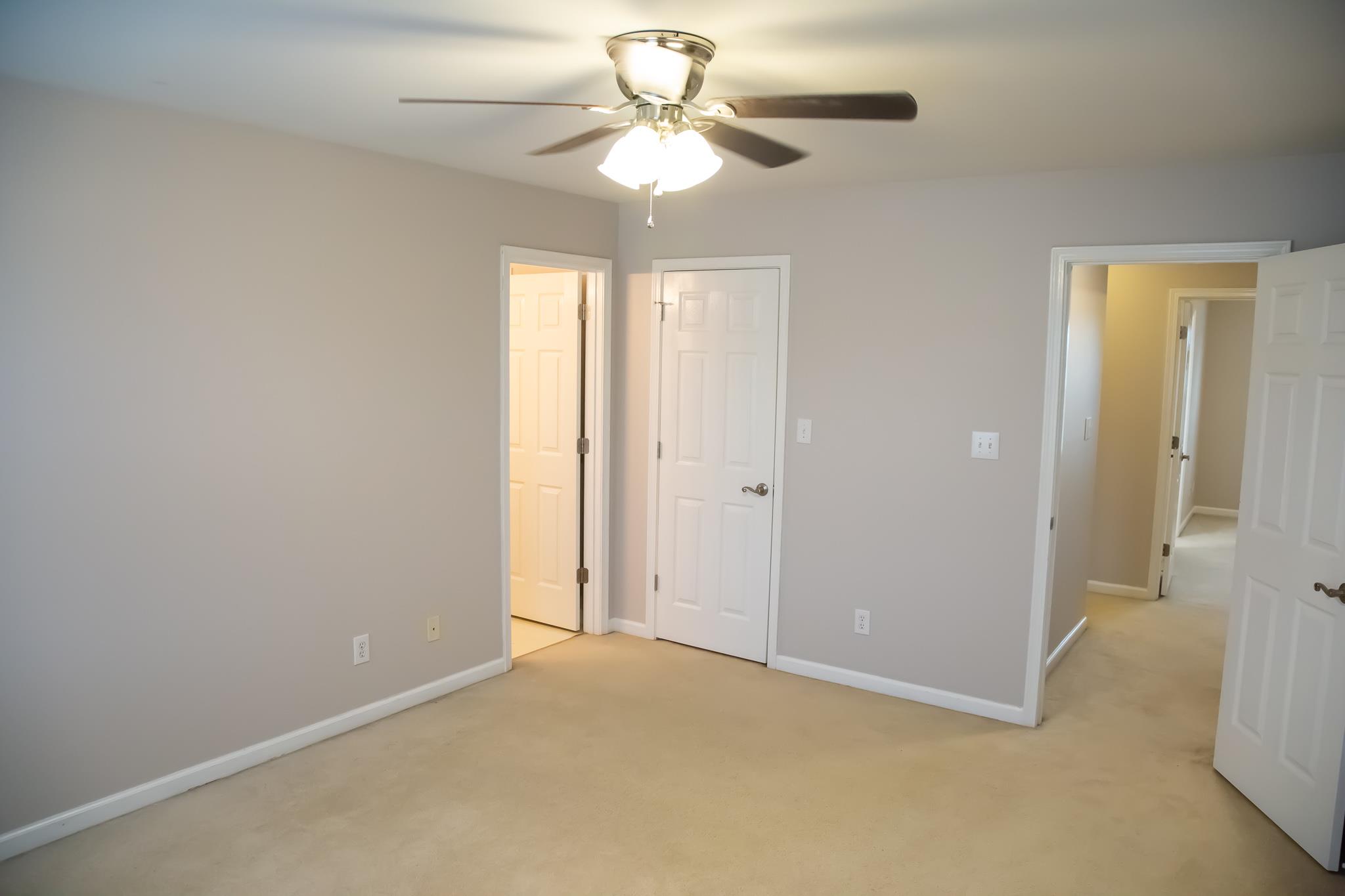 4871 Sango Road Clarksville, TN 37043 - Photo 24 of 30 a view of a room with a ceiling fan and a chandelier fan