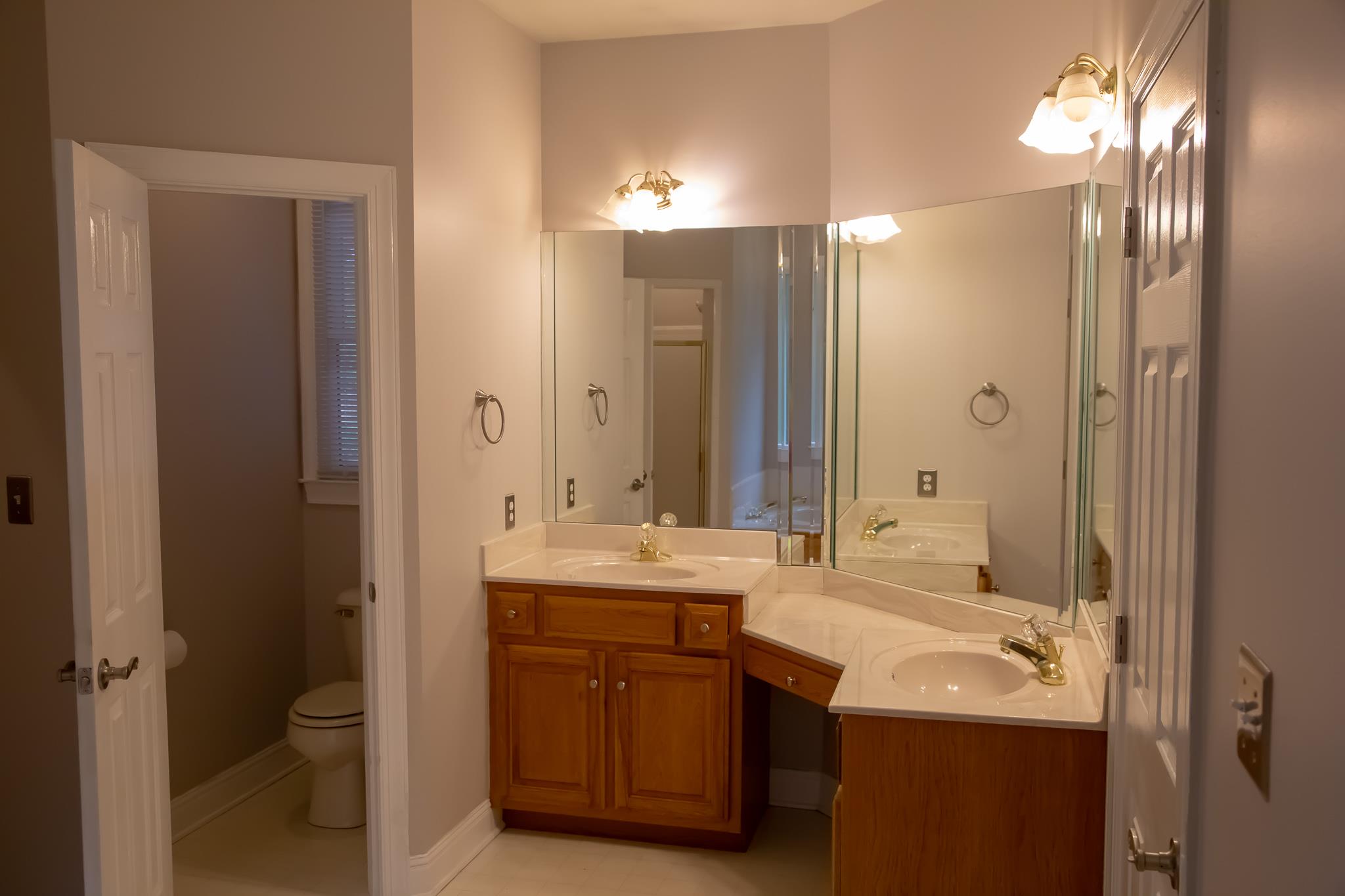 4871 Sango Road Clarksville, TN 37043 - Photo 29 of 30 a bathroom with a double vanity sink mirror and double