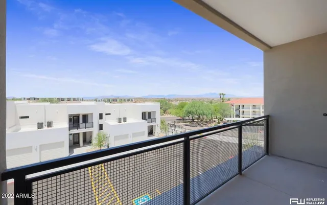 a view of a building from a balcony