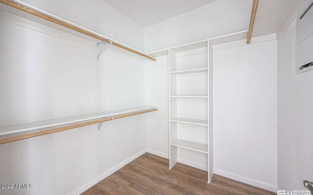 a view of an empty walk in closet